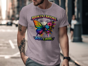 T-shirt with "BROKEN CRAYONS STILL COLOR" text and a colorful butterfly design.