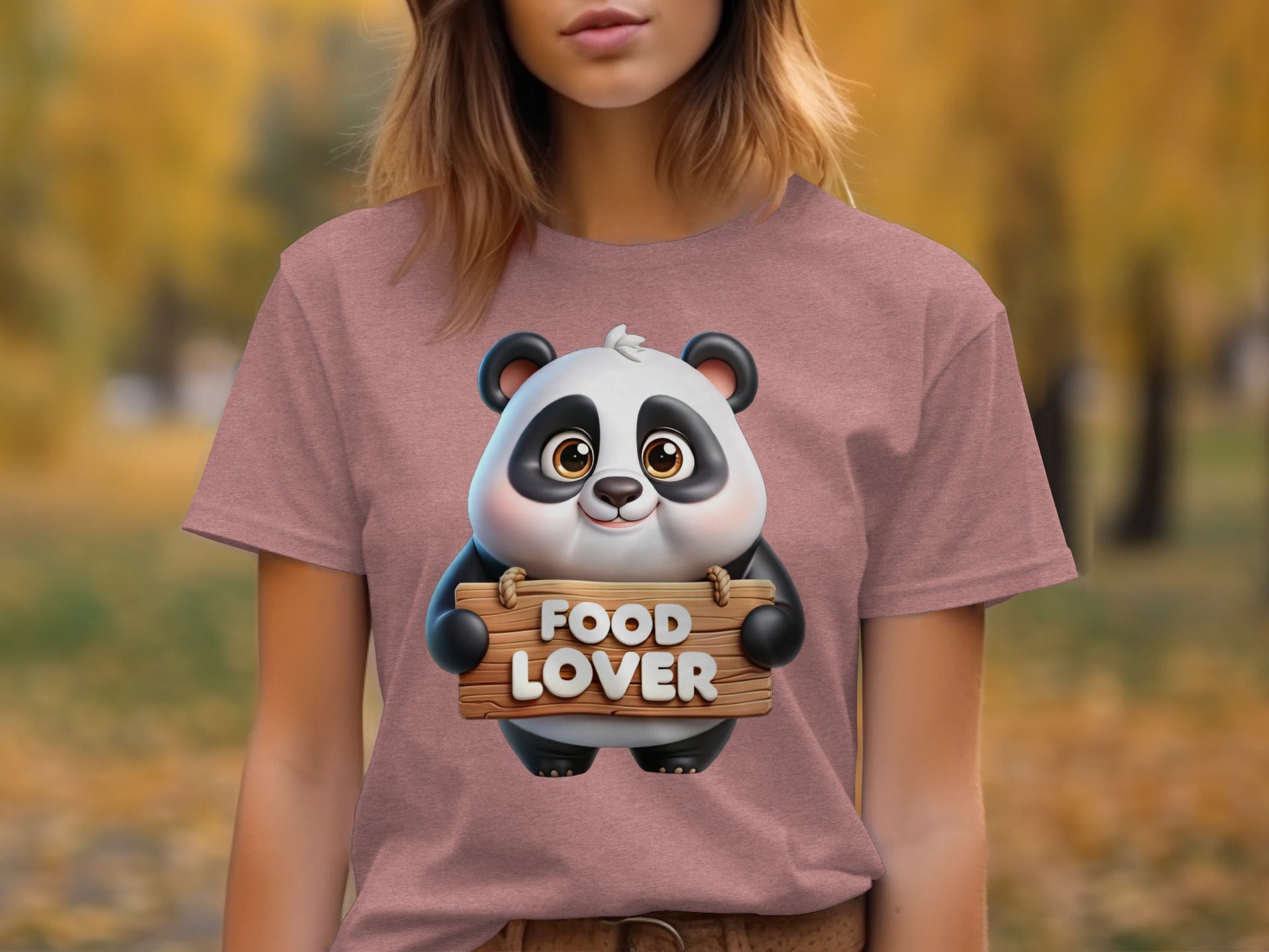 Pink t-shirt with cute cartoon panda holding a wooden sign that says "FOOD LOVER".