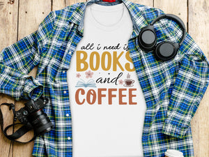 White t-shirt with text "All I Need is Books and Coffee" and graphics.