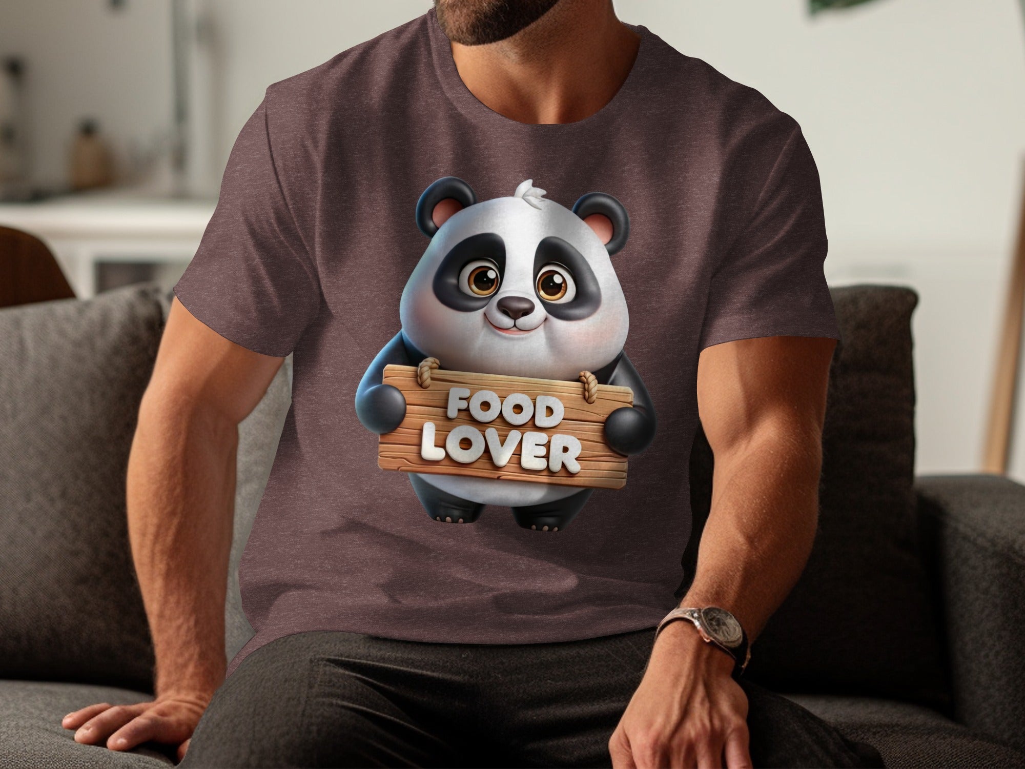 Cartoon panda holding a "Food Lover" sign on a brown t-shirt.