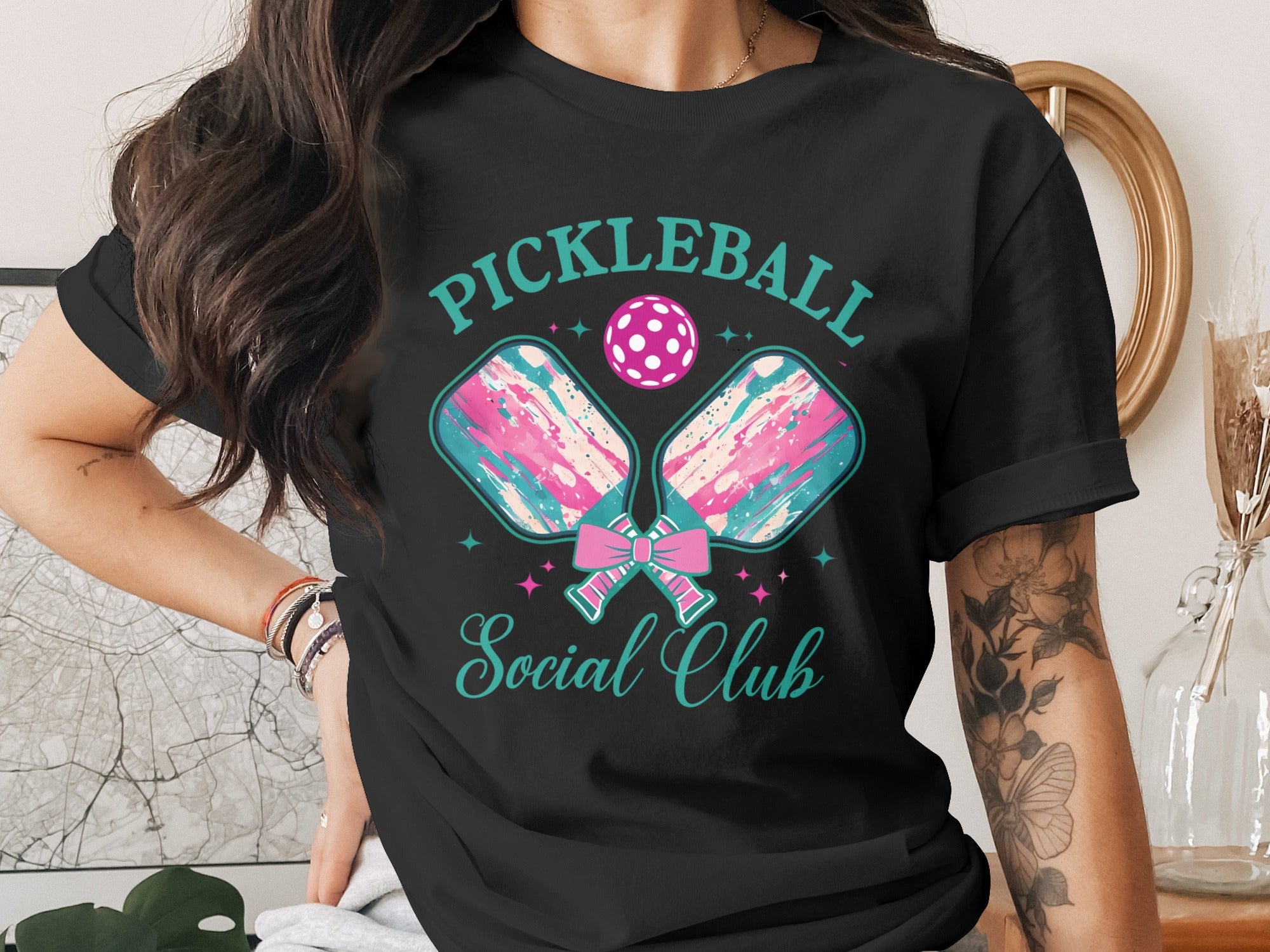 Black t-shirt with "Pickleball Social Club" graphic and crossed paddles.