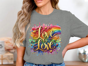 Golden text "Love is Love" with rainbow and hearts on a gray t-shirt.