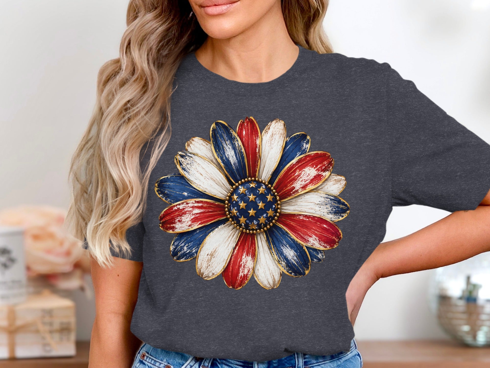 Dark gray t-shirt with patriotic daisy graphic in red, white, and blue.