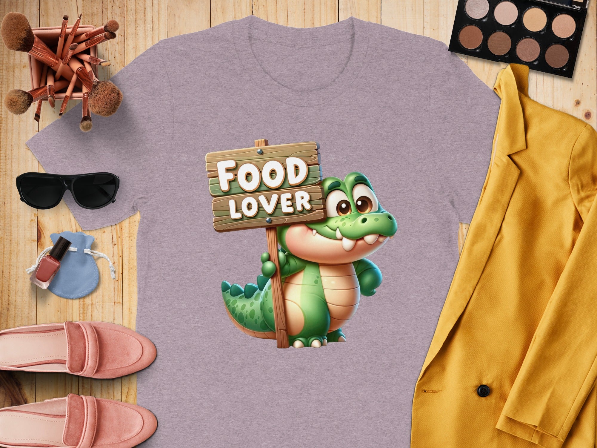 T-shirt with cartoon alligator holding sign that says "Food Lover".