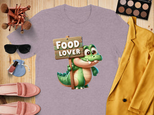 T-shirt with cartoon alligator holding sign that says "Food Lover".