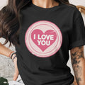 Black t-shirt with a pink heart graphic reading "I LOVE YOU".