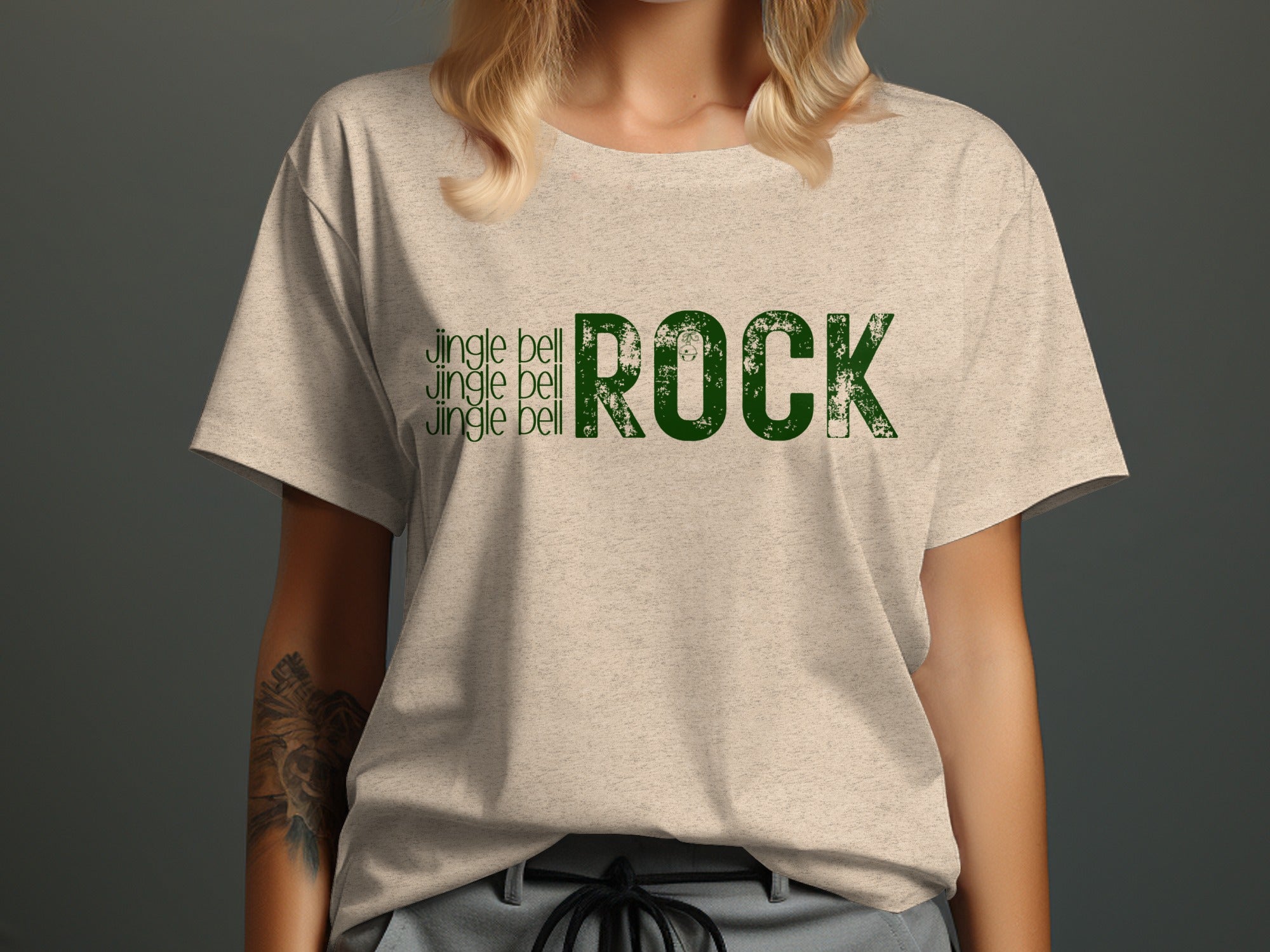 Light beige t-shirt with green text "jingle bell jingle bell jingle bell ROCK".