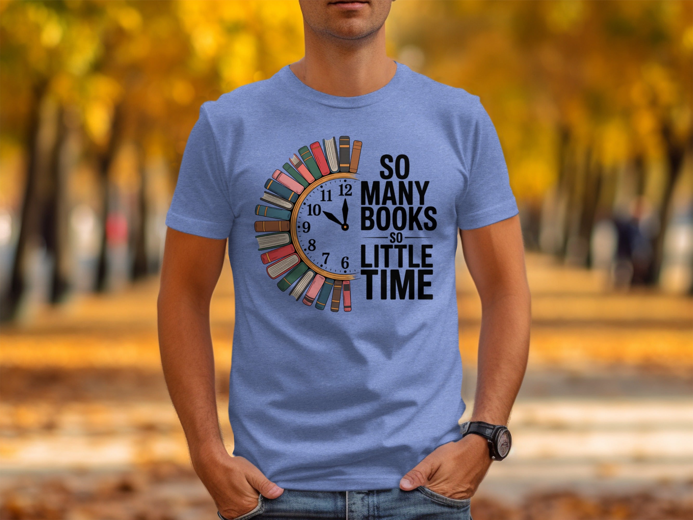 Blue t-shirt with clock design of books and text "So Many Books So Little Time".