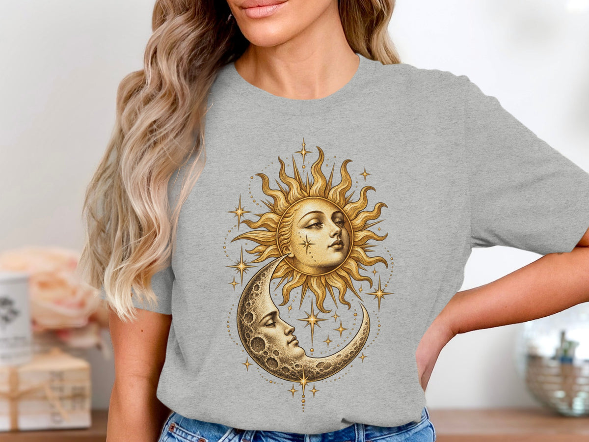 Grey t-shirt with sun and moon faces artwork and surrounding stars.