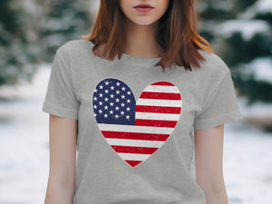 Grey t-shirt with a distressed American flag heart graphic.