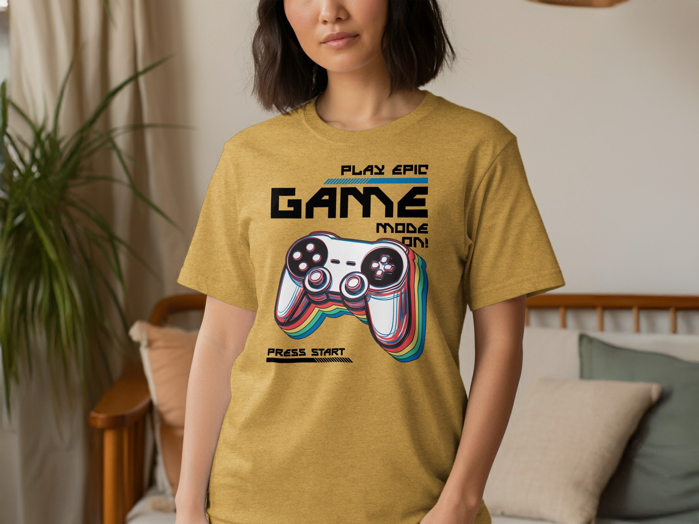 Yellow t-shirt with "PLAY EPIC GAME MODE ON!" and video game controller graphic.