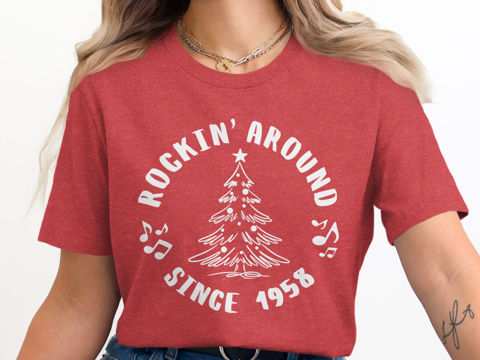 Red t-shirt with white text "ROCKIN' AROUND SINCE 1958" and Christmas tree graphic.