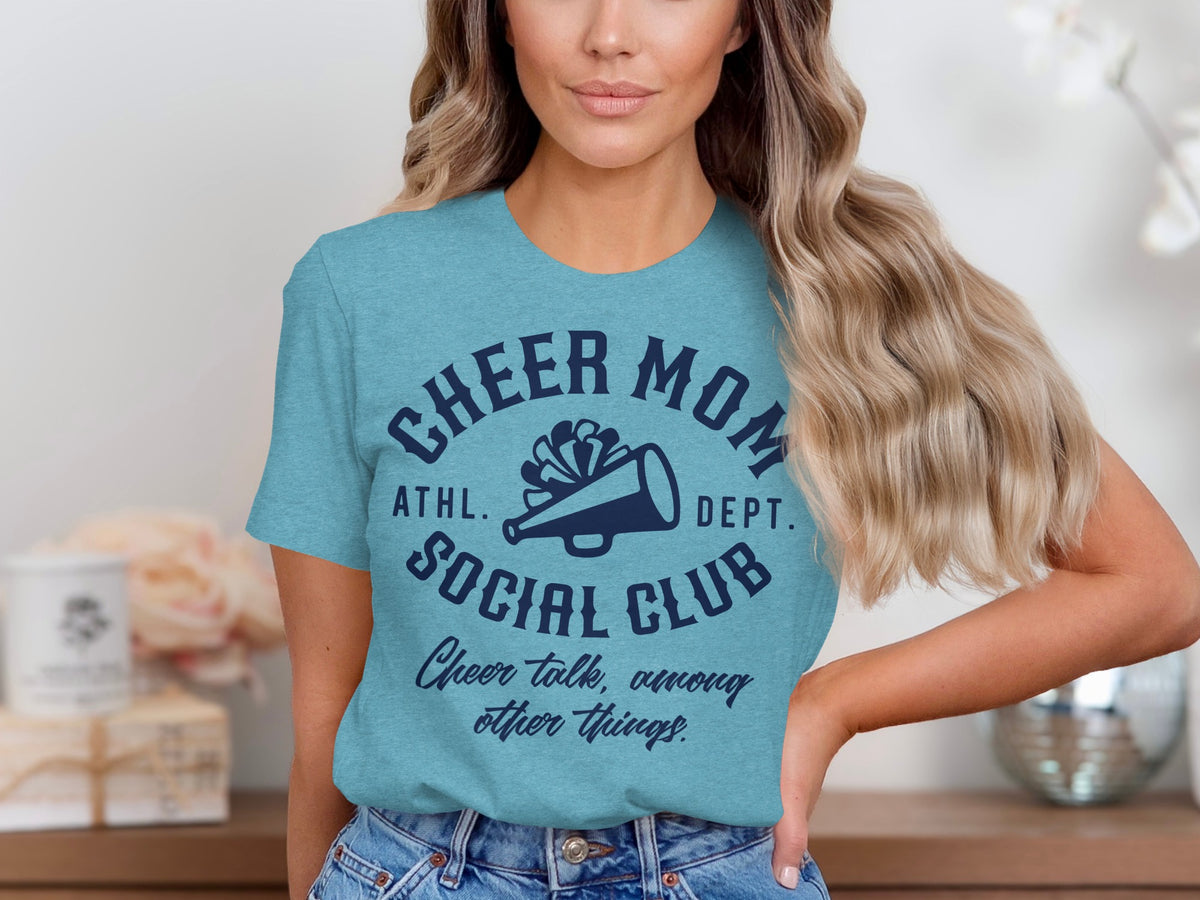 Turquoise t-shirt with "Cheer Mom Social Club" and megaphone design.