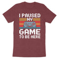 Maroon t-shirt with "I paused my GAME to be here" text and pixelated game controller.