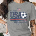 USA Soccer World Cup '26 t-shirt with distressed graphic and American flag.