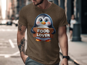 Brown t-shirt with a cartoon penguin holding a "FOOD LOVER" sign.