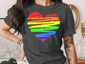 Dark t-shirt with a rainbow heart design and textured brushstrokes.