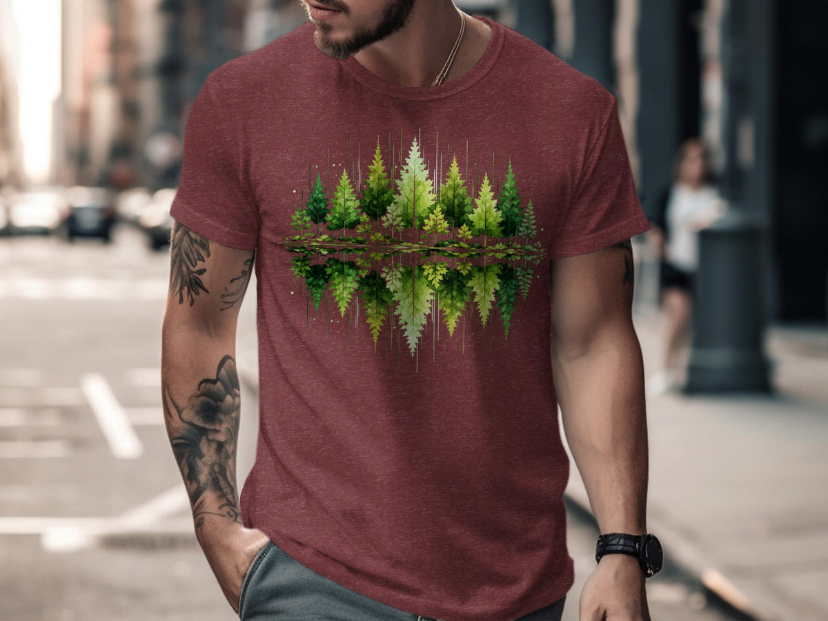 T-shirt with a graphic of green trees reflected in water.
