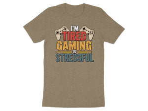 T-shirt with "I'M TIRED GAMING IS STRESSFUL" text and game controllers.