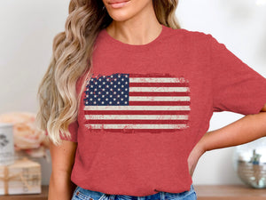Red t-shirt with distressed American flag graphic.