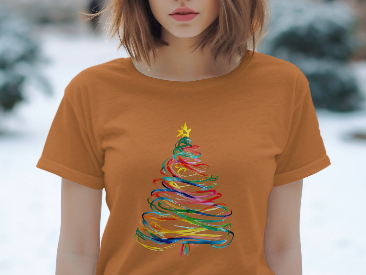 Orange t-shirt with a colorful, abstract Christmas tree design.