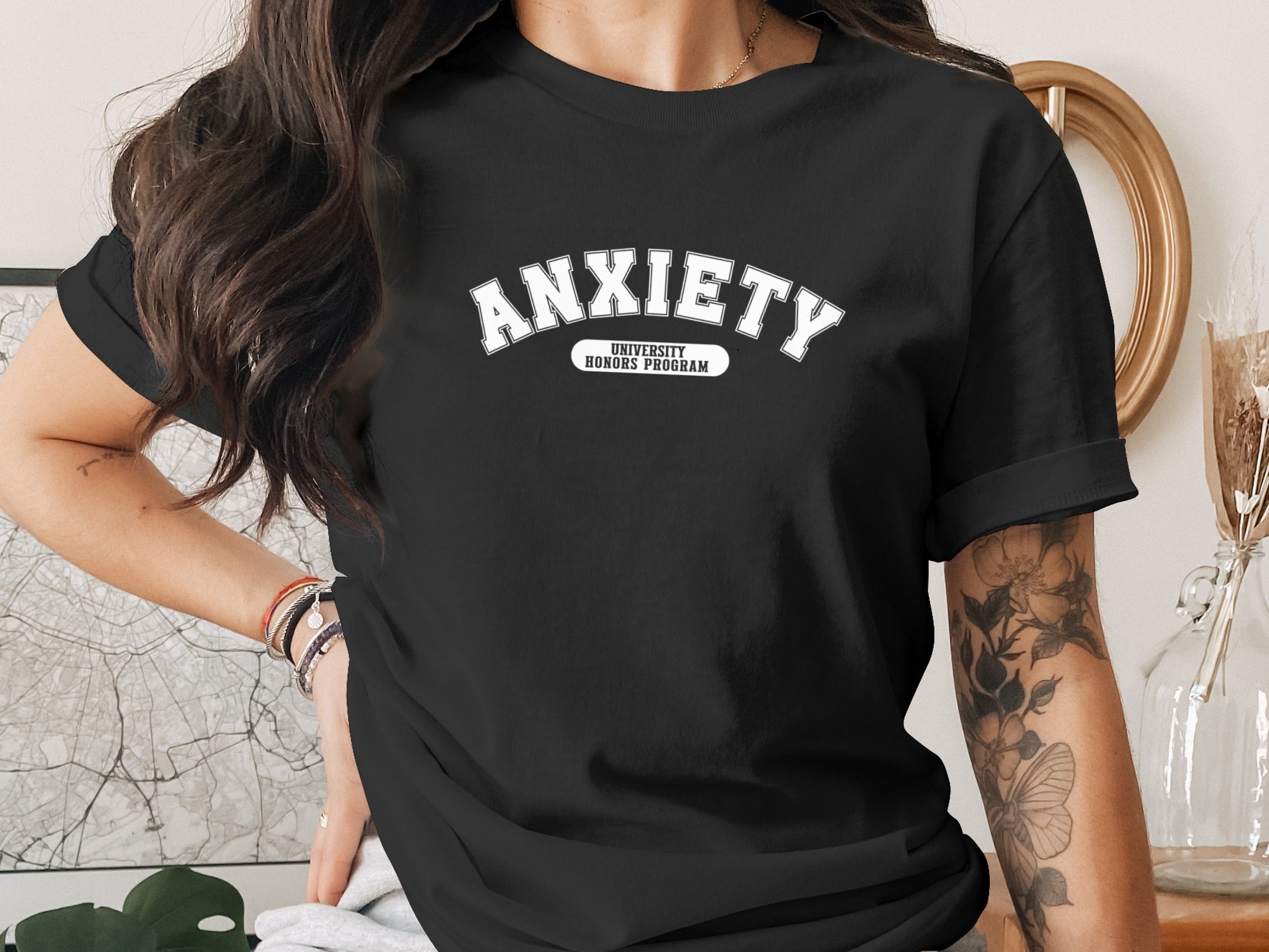 Black t-shirt with "Anxiety University Honors Program" text design.