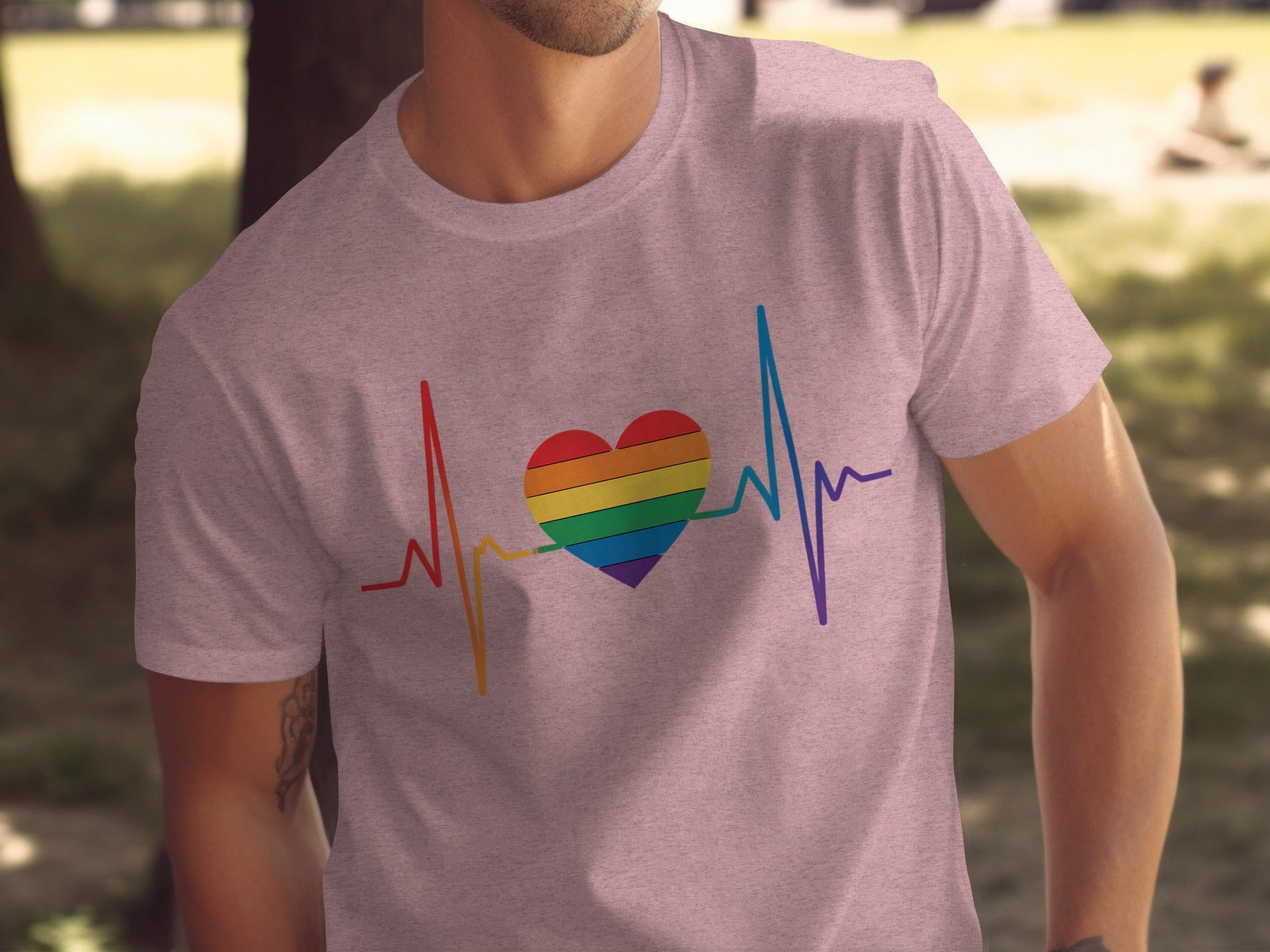 Pink t-shirt with rainbow heart and electrocardiogram design