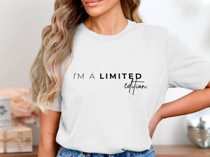 White t-shirt with "I'M A LIMITED edition." text.