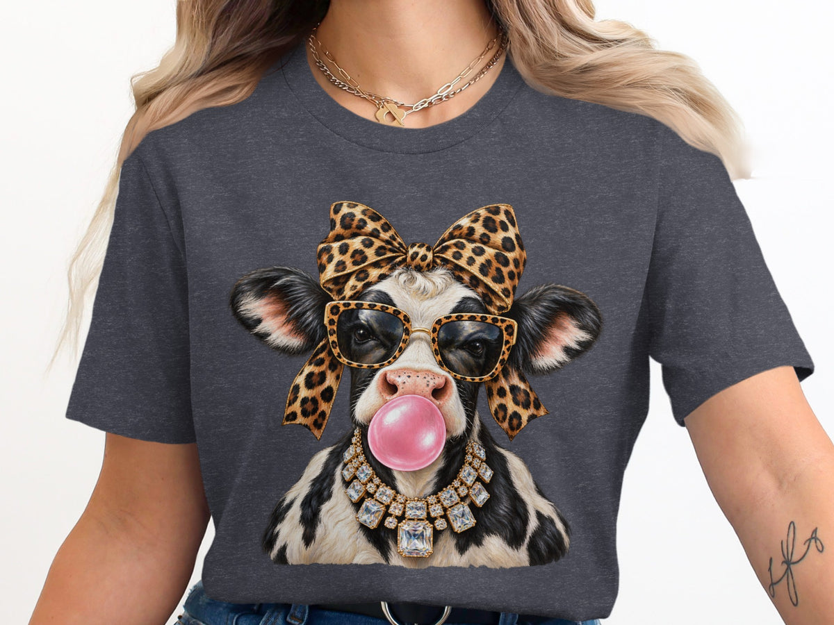Cow with leopard bow, sunglasses, chewing pink bubblegum, and diamond necklace.