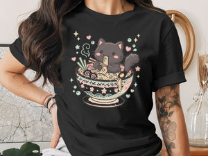 Black t-shirt with a kawaii black cat eating ramen from a decorative bowl.