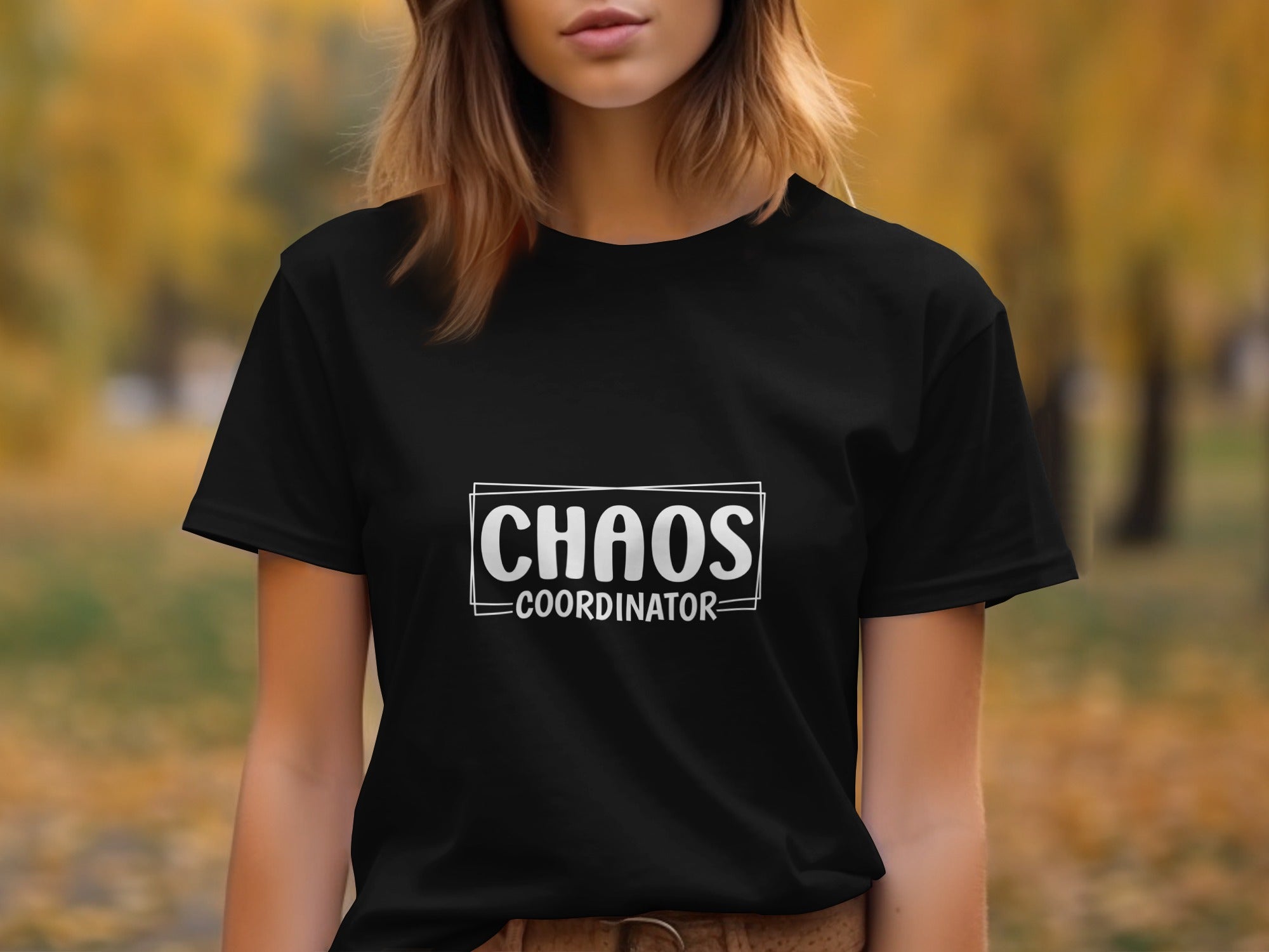 Black t-shirt with white text reading "CHAOS COORDINATOR" inside a rectangle.