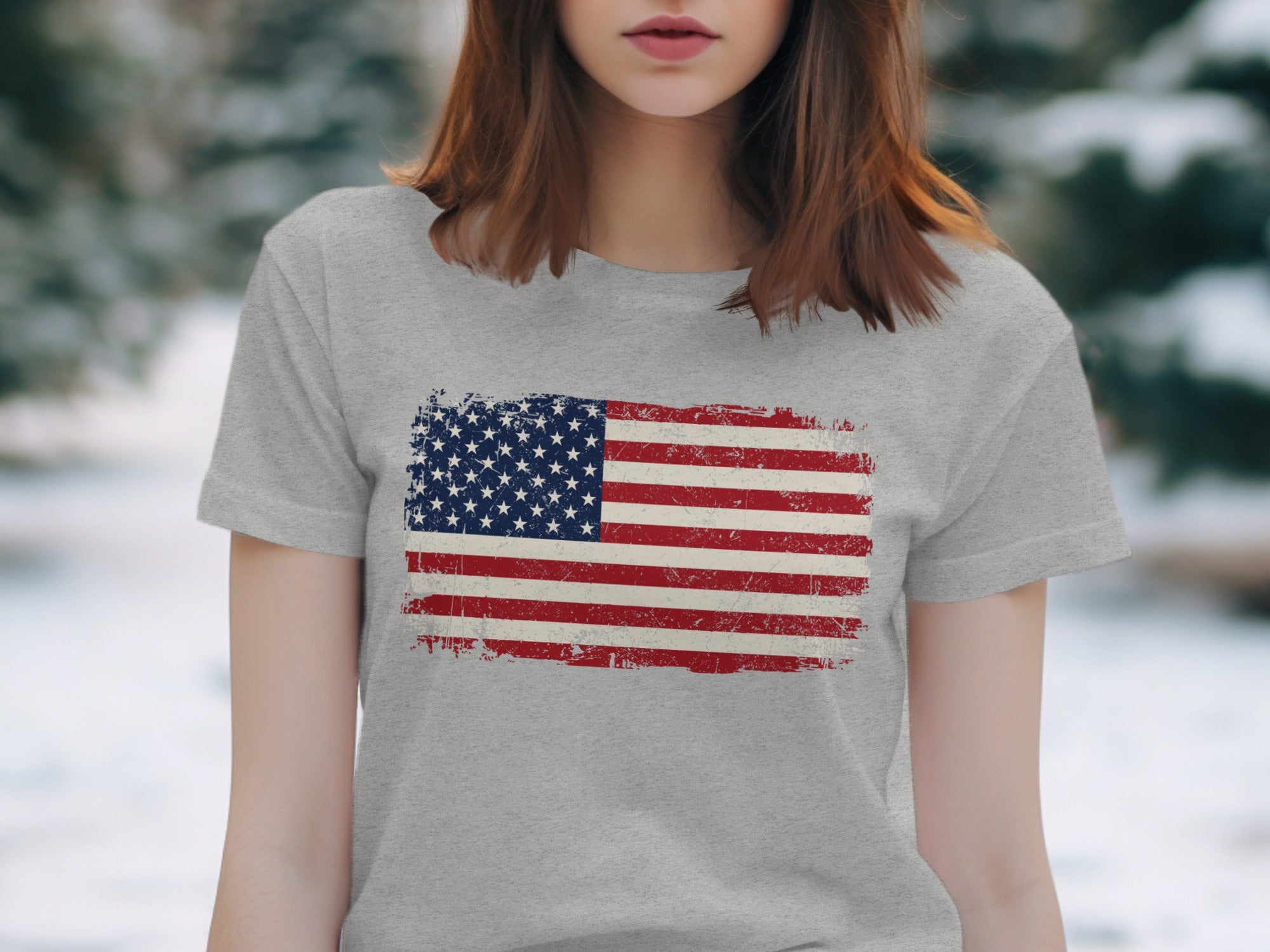 Grey t-shirt with distressed American flag graphic on front.