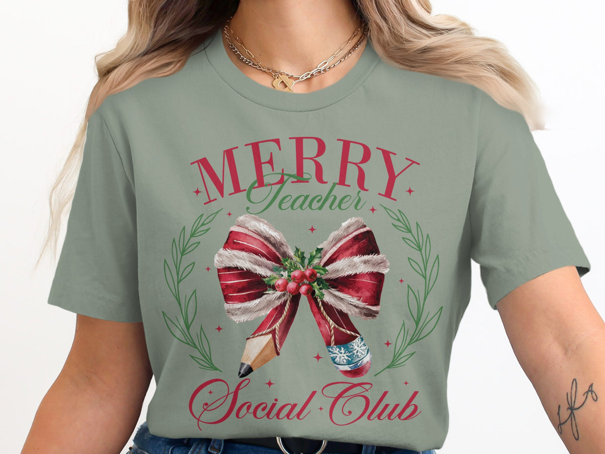 Green t-shirt with "Merry Teacher Social Club" text and Christmas-themed pencil design.
