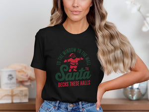 Black t-shirt with Santa graphic and text "Til Santa Decks These Halls".