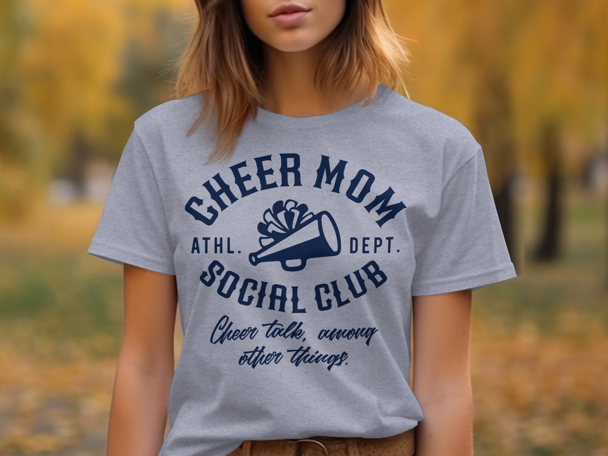 Grey t-shirt with navy text: Cheer Mom Athl. Dept. Social Club Cheer talk, among other things.