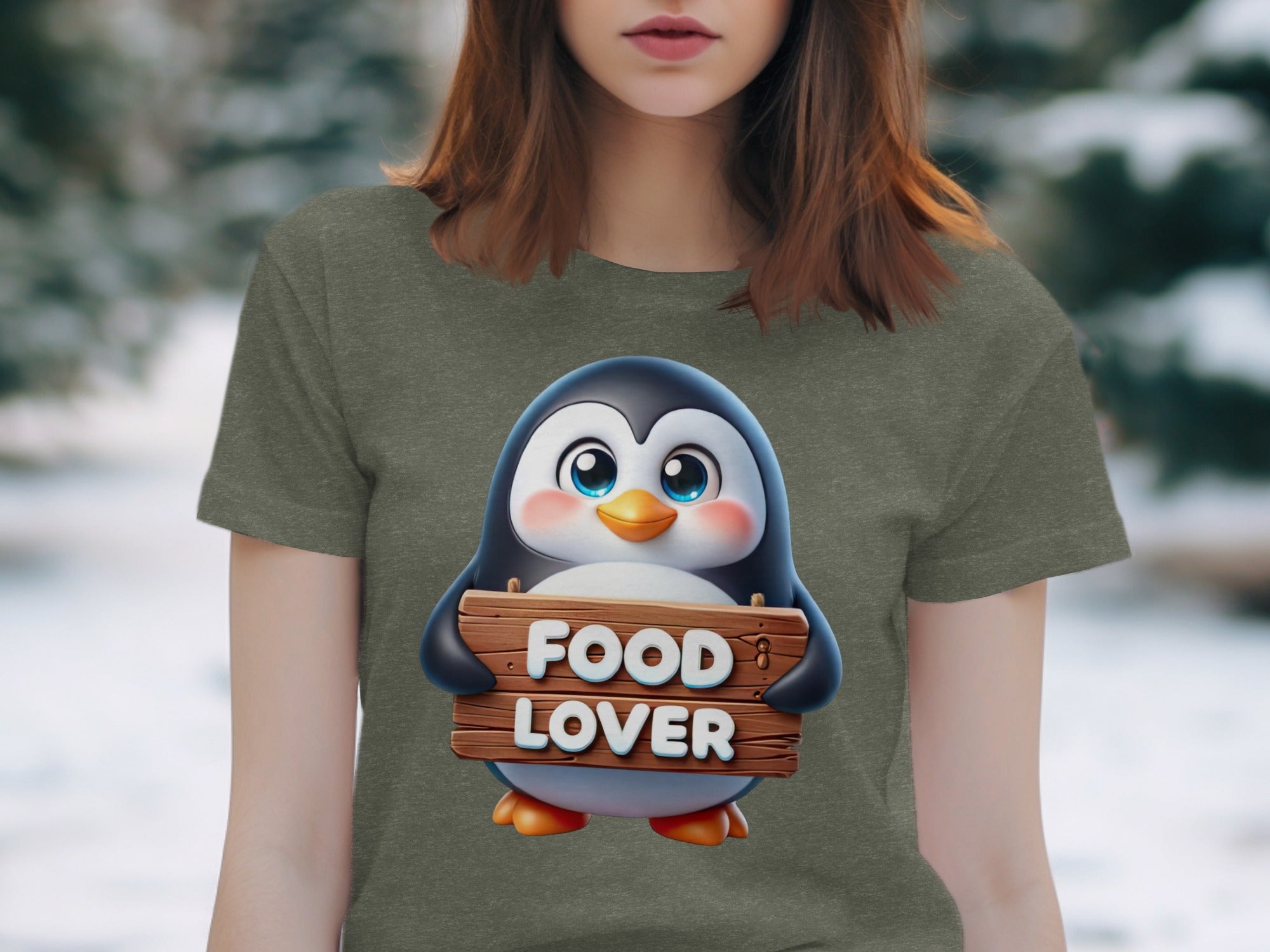 Cute cartoon penguin on t-shirt holding a wooden sign that says "FOOD LOVER".