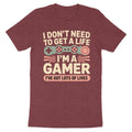 Maroon t-shirt with "I DON'T NEED TO GET A LIFE I'M A GAMER I'VE GOT LOTS OF LIVES" text.