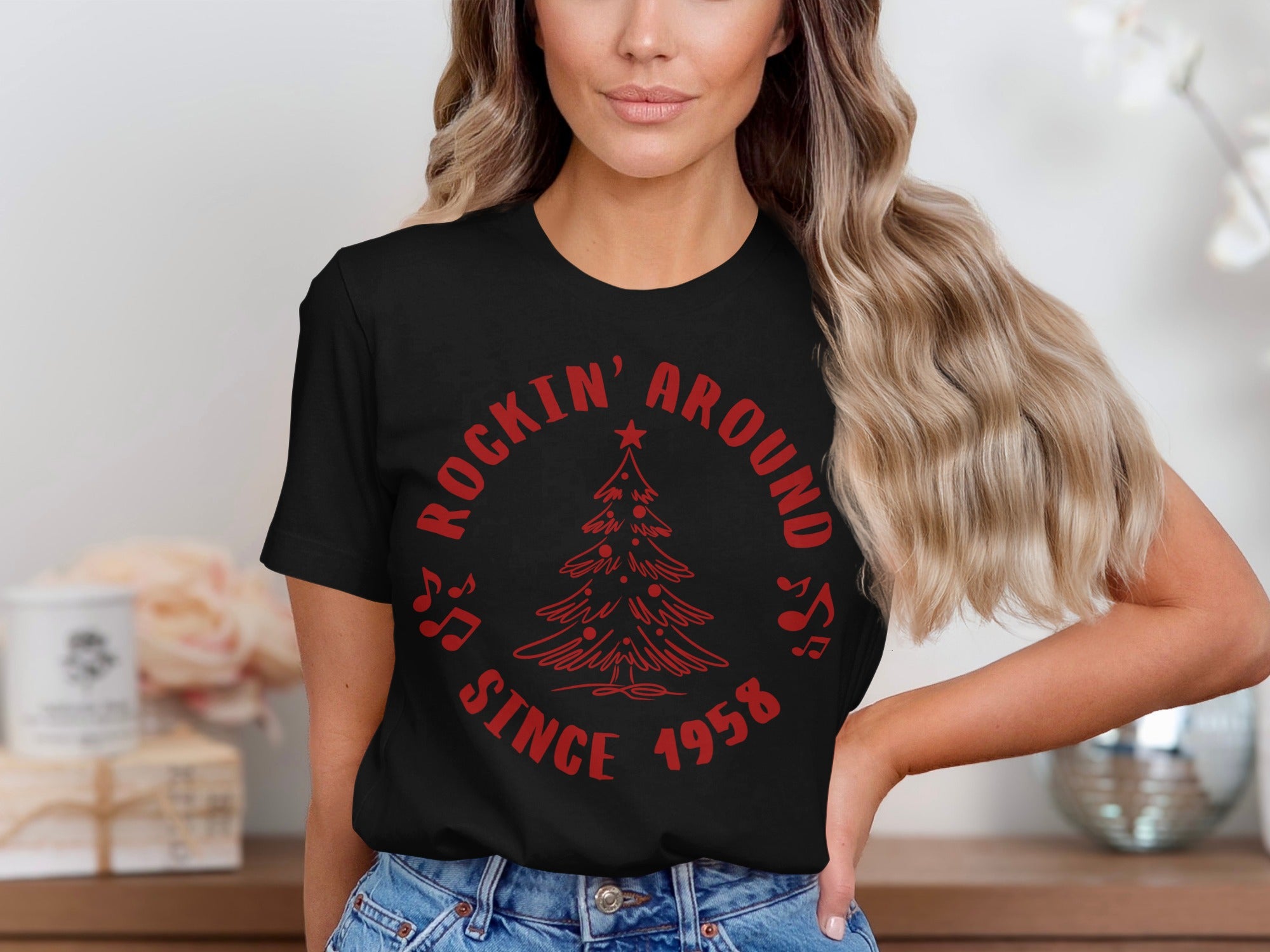 Black t-shirt with red Christmas tree graphic and "Rockin' Around Since 1958" text.