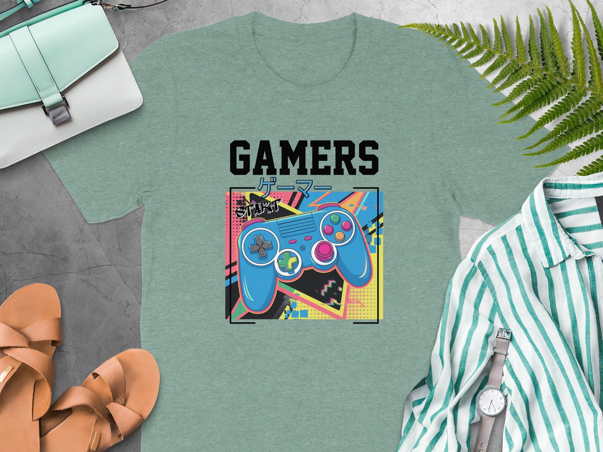 Green t-shirt with "GAMERS" and a retro video game controller graphic.