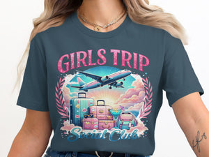 Girls Trip Social Club graphic with airplane, suitcases, and drinks on a t-shirt.