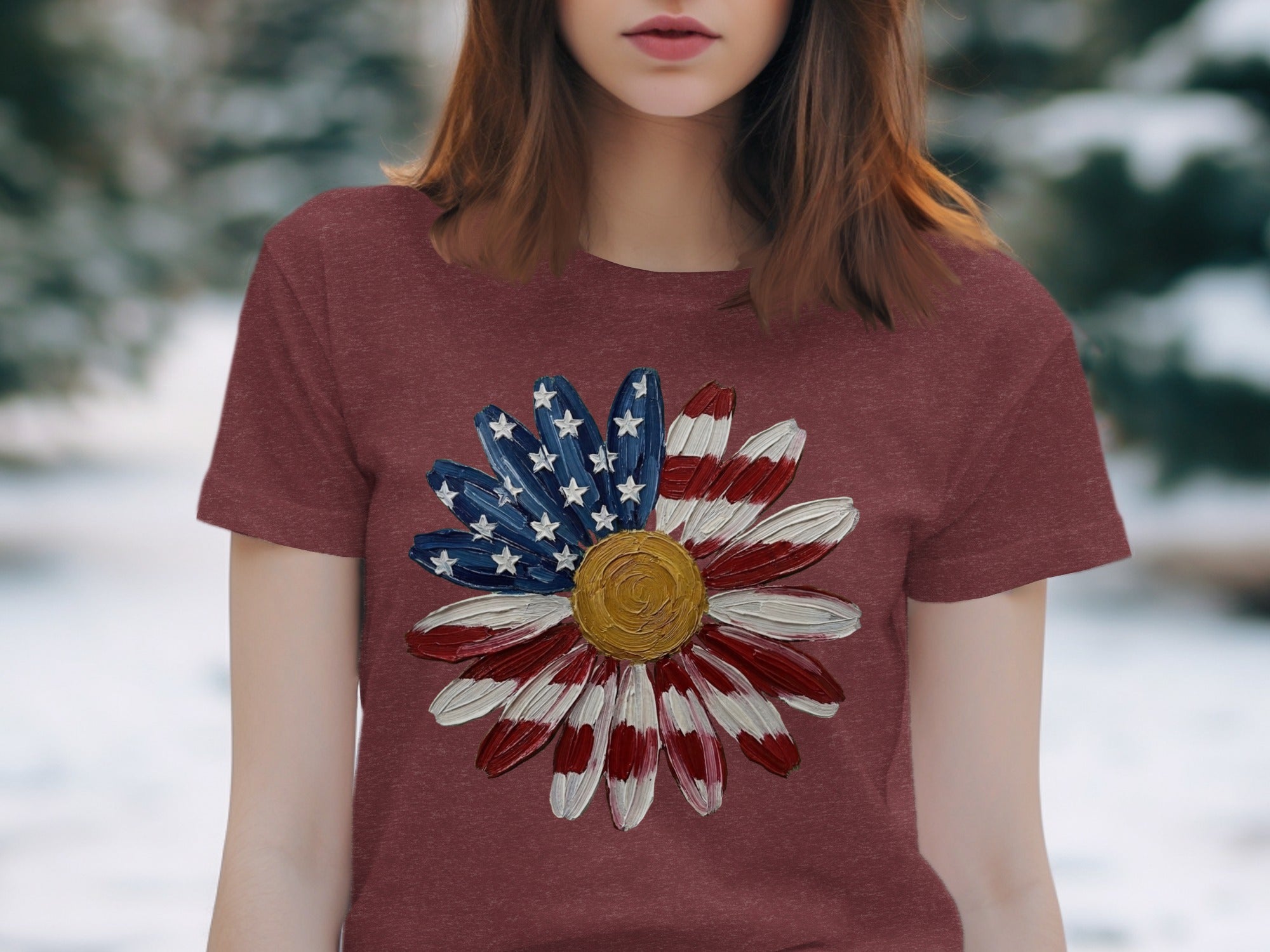 Burgundy t-shirt with a daisy design in American flag colors.