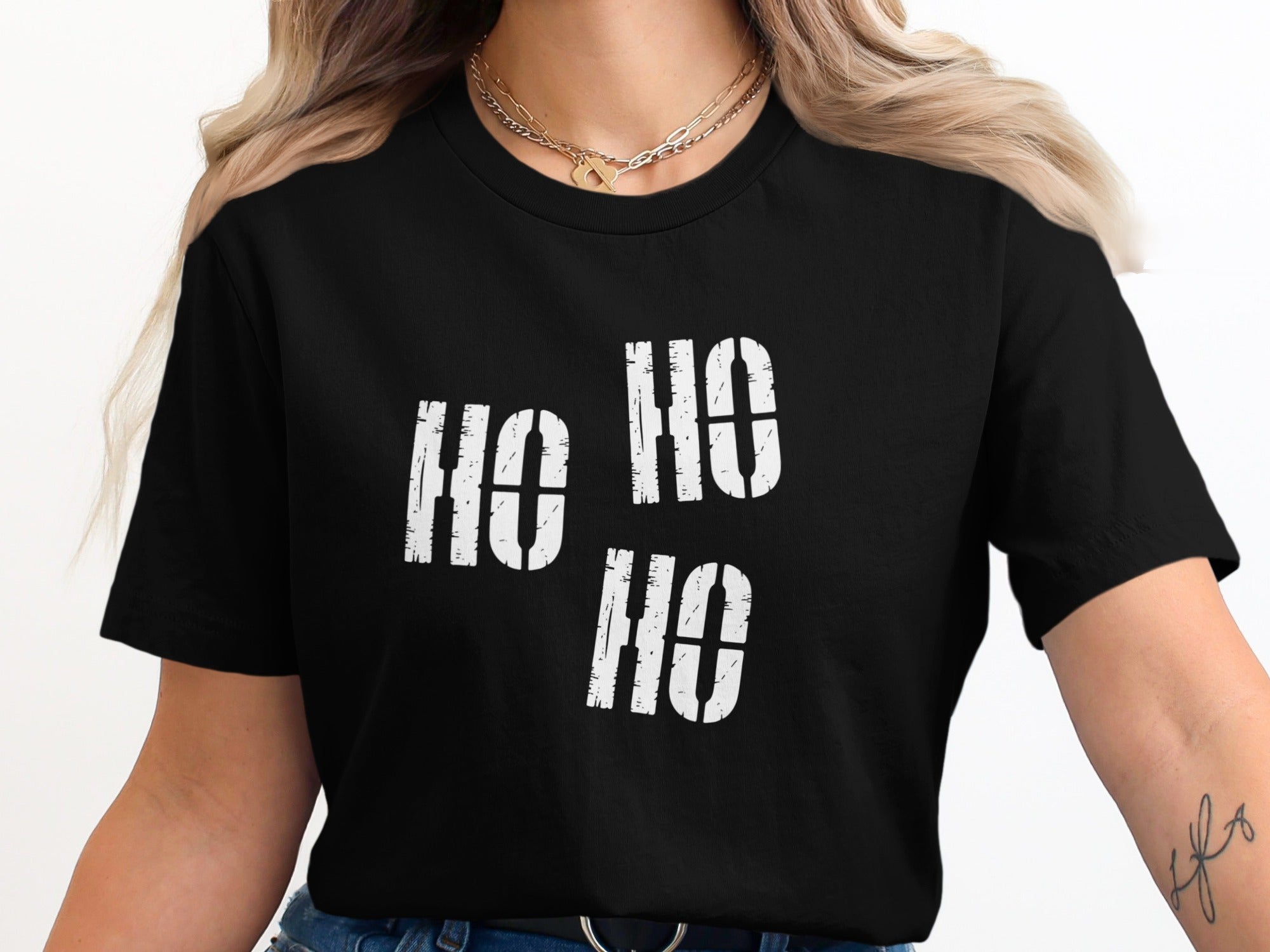 Black t-shirt with white "Ho Ho Ho" text in distressed block letters.