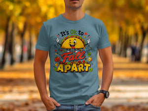 T-shirt with cartoon taco and text "It's Ok to Fall Apart".