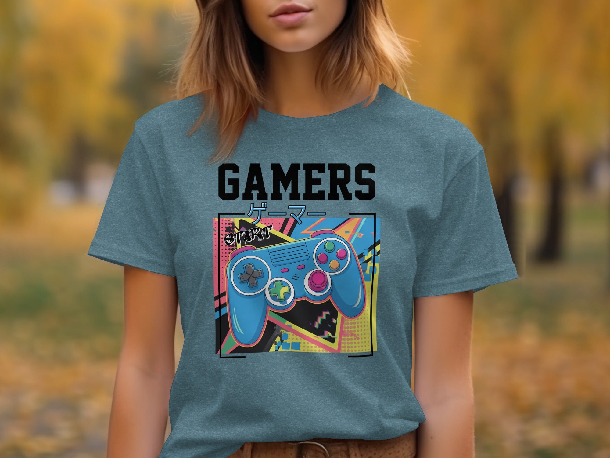 Teal t-shirt with "GAMERS" text and a retro video game controller graphic.