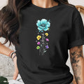 Black t-shirt with a watercolor floral design spelling out "Mama."