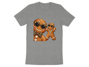 Two gingerbread cookies wearing sunglasses and jewelry on a gray t-shirt.