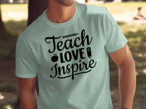 Light green t-shirt with "Teach Love Inspire" and apple and pencil graphic.