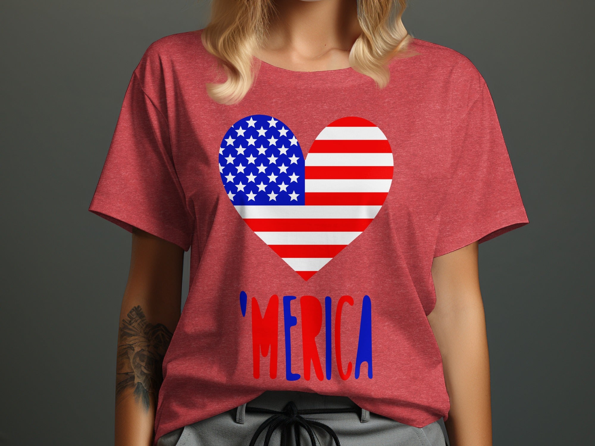 Red t-shirt with American flag heart and "MERICA" text graphic.