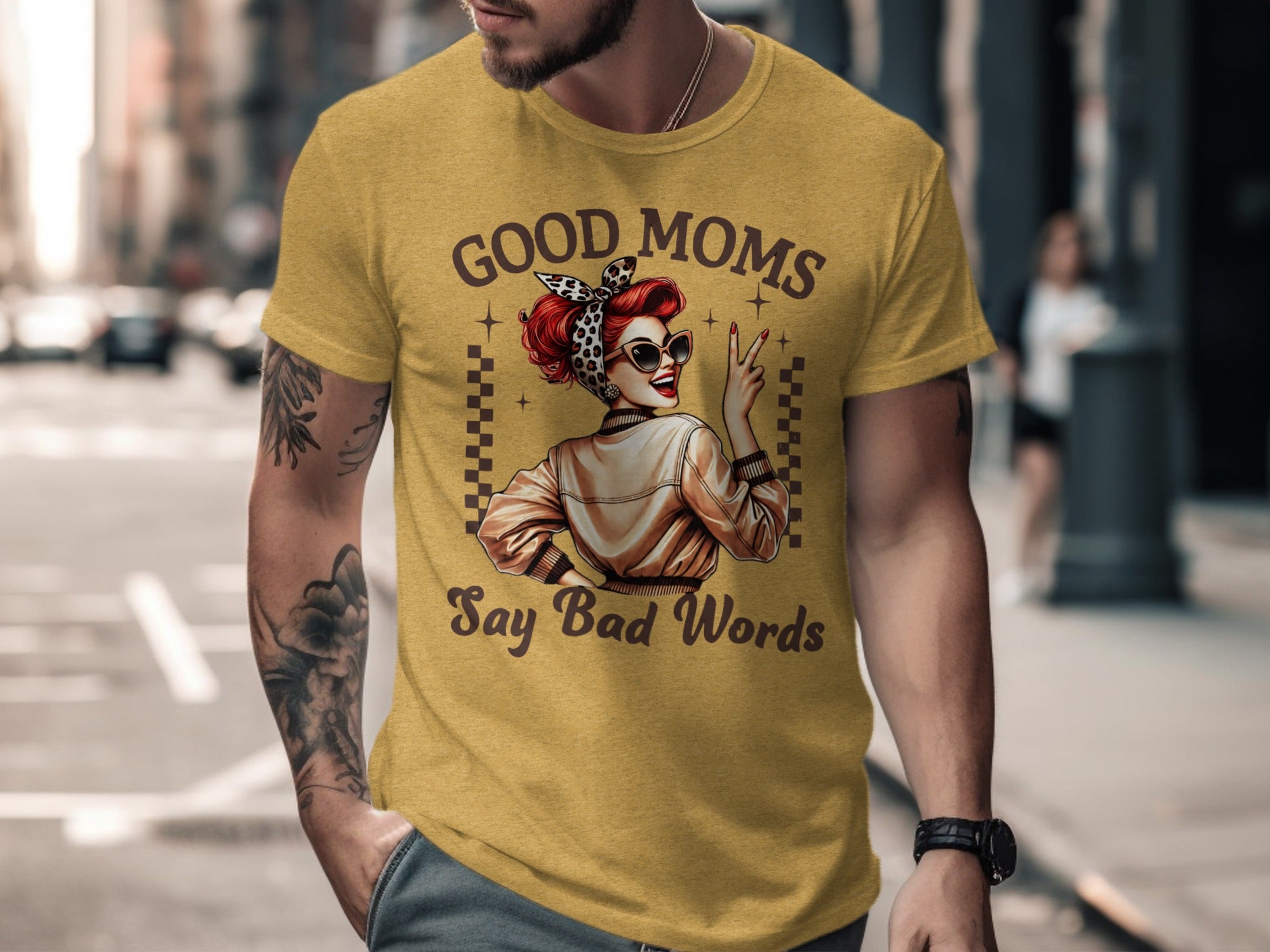 Yellow t-shirt graphic: "Good Moms Say Bad Words" with retro woman illustration.