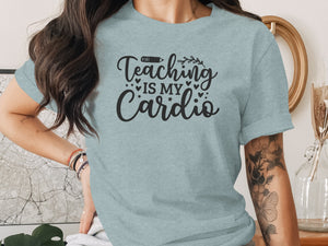 Light blue t-shirt with black script text that reads "Teaching Is My Cardio".